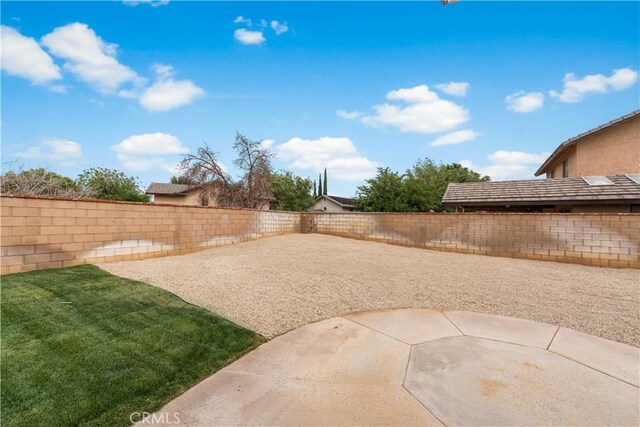 42346 W 47th St W, Lancaster, CA 93536 - fenced backyard featuring a patio