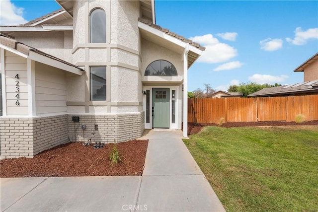 42346 W 47th St W, Lancaster, CA 93536 - doorway to property with stucco siding
