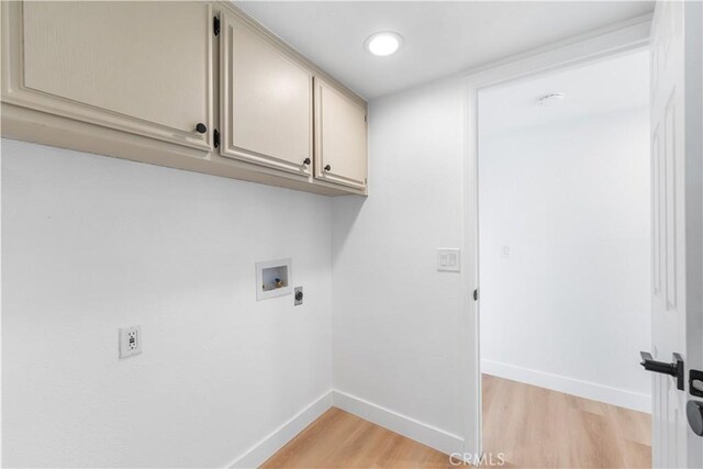 42346 W 47th St W, Lancaster, CA 93536 - laundry room with light wood-style floors, washer hookup, cabinet space, baseboards, and electric dryer hookup