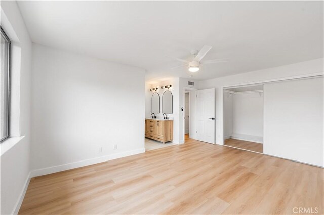 42346 W 47th St W, Lancaster, CA 93536 - unfurnished bedroom featuring light wood-style floors, a closet, baseboards, and ceiling fan