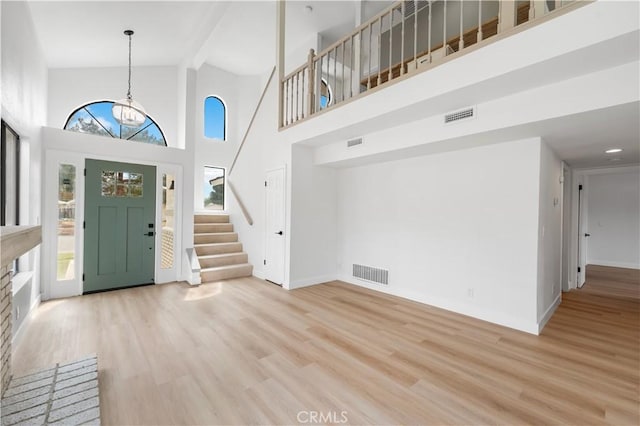 42346 W 47th St W, Lancaster, CA 93536 - entryway featuring healthy amount of natural light, high vaulted ceiling, wood finished floors, and beamed ceiling