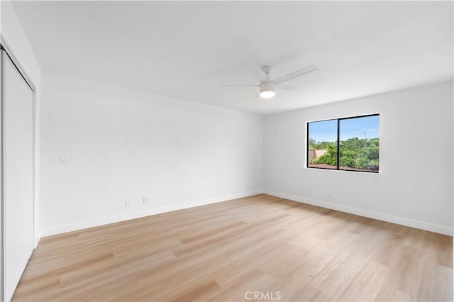 42346 W 47th St W, Lancaster, CA 93536 - unfurnished bedroom with light wood-type flooring, a closet, baseboards, and ceiling fan