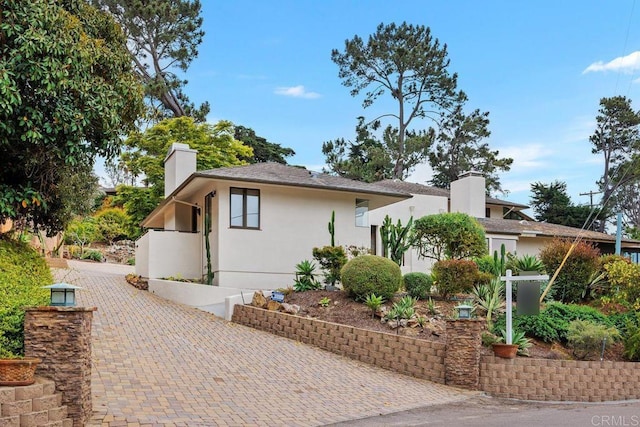 1859 Zapo St, Del Mar, CA 92014 - view of front of property featuring a chimney and stucco siding