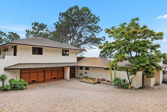 1859 Zapo St, Del Mar, CA 92014 - view of front of property featuring decorative driveway, a garage, stucco siding, and a shingled roof