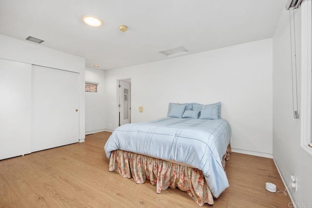 1859 Zapo St, Del Mar, CA 92014 - bedroom featuring attic access, wood finished floors, and a closet