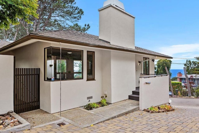 1859 Zapo St, Del Mar, CA 92014 - entrance to property featuring a chimney, stucco siding, and a shingled roof