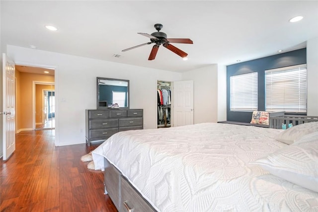 7129 Forbes Ave, Van Nuys, CA 91406 - bedroom with dark wood finished floors, recessed lighting, a walk in closet, baseboards, and a ceiling fan