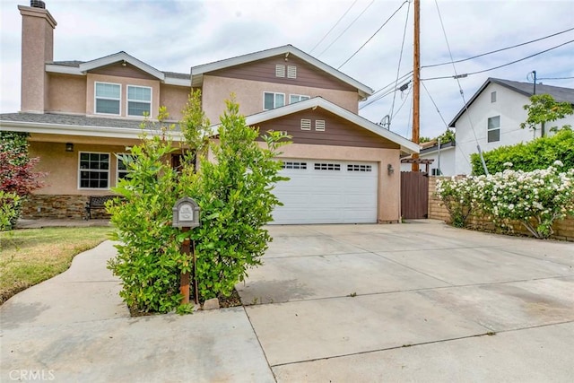 7129 Forbes Ave, Van Nuys, CA 91406 - traditional-style home with stucco siding, driveway, a garage, and a chimney