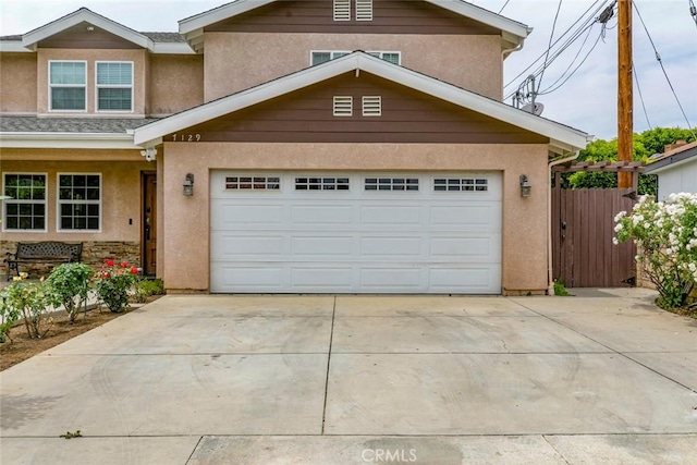 7129 Forbes Ave, Van Nuys, CA 91406 - traditional-style home featuring driveway, stucco siding, and a garage