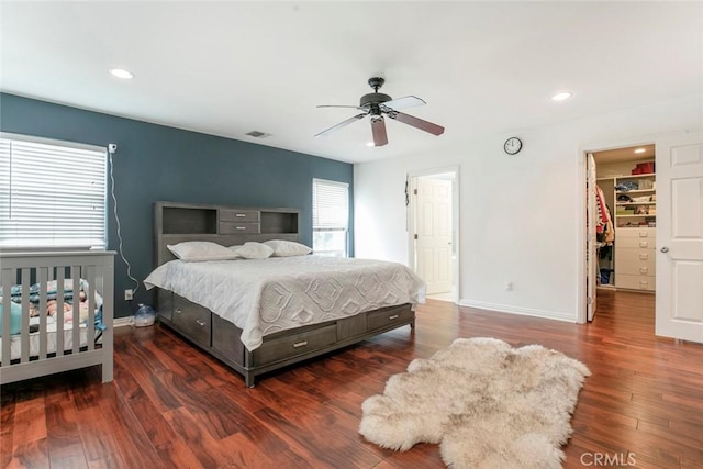 7129 Forbes Ave, Van Nuys, CA 91406 - bedroom with baseboards, wood finished floors, recessed lighting, a walk in closet, and a ceiling fan