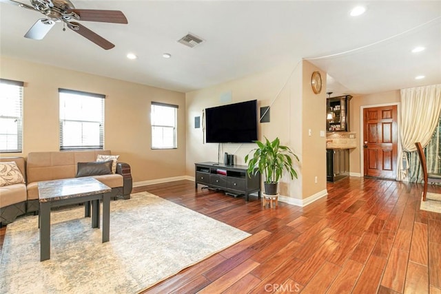 7129 Forbes Ave, Van Nuys, CA 91406 - living room featuring recessed lighting, wood finished floors, baseboards, and ceiling fan