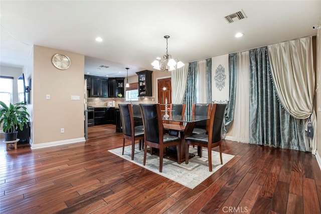 7129 Forbes Ave, Van Nuys, CA 91406 - dining room with a chandelier, healthy amount of natural light, dark wood finished floors, baseboards, and recessed lighting