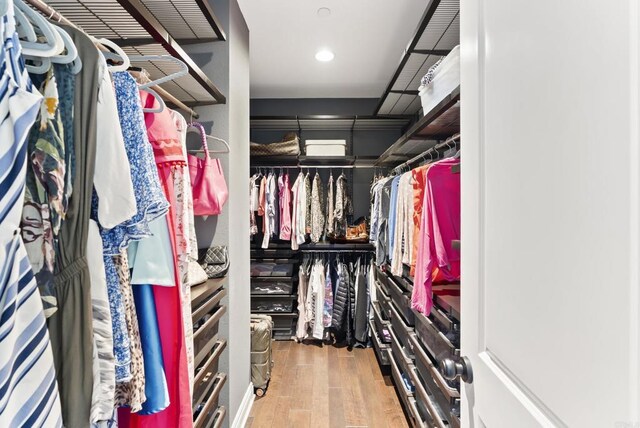 14220 Green Valley Ct, Scripps Miramar, CA 92131 - walk in closet with wood finished floors