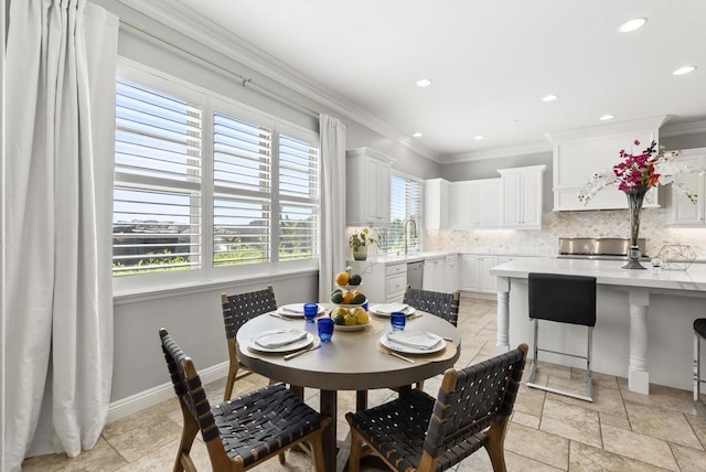 14220 Green Valley Ct, Scripps Miramar, CA 92131 - dining space with ornamental molding, recessed lighting, stone tile flooring, and baseboards