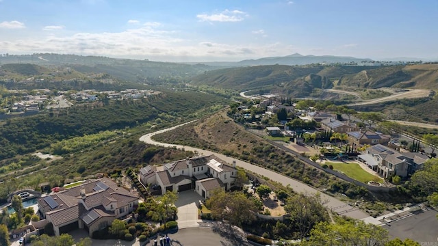 14220 Green Valley Ct, Scripps Miramar, CA 92131 - aerial overview of property's location featuring nearby suburban area and a mountainous background