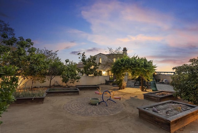 14220 Green Valley Ct, Scripps Miramar, CA 92131 - view of patio / terrace featuring a vegetable garden