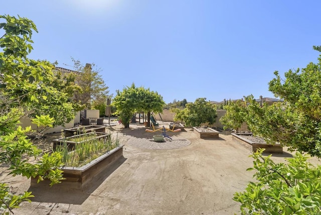 14220 Green Valley Ct, Scripps Miramar, CA 92131 - view of patio / terrace with a garden