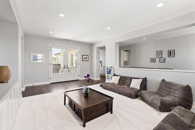 14220 Green Valley Ct, Scripps Miramar, CA 92131 - living room featuring wood finished floors, recessed lighting, baseboards, and french doors