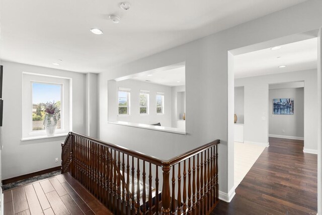 14220 Green Valley Ct, Scripps Miramar, CA 92131 - hallway featuring wood finished floors, recessed lighting, and baseboards