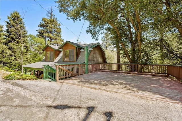 379 Dorn Dr, Crestline, CA 92325 - view of front facade featuring a wooden deck
