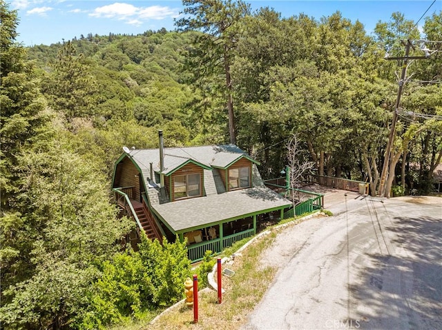 379 Dorn Dr, Crestline, CA 92325 - view of subject property featuring a heavily wooded area