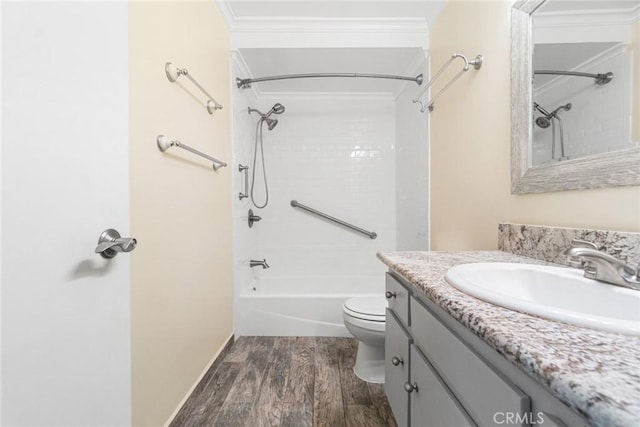 3603 W Hidden Ln Unit 317, Rolling Hills Estates, CA 90274 - bathroom featuring ornamental molding, wood finished floors, shower / bathtub combination, toilet, and vanity