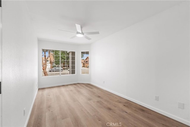 37109 Daisy St, Palmdale, CA 93550 - unfurnished room with wood finished floors, a ceiling fan, and baseboards