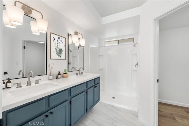 37109 Daisy St, Palmdale, CA 93550 - full bathroom featuring double vanity, a shower, and marble look tiles