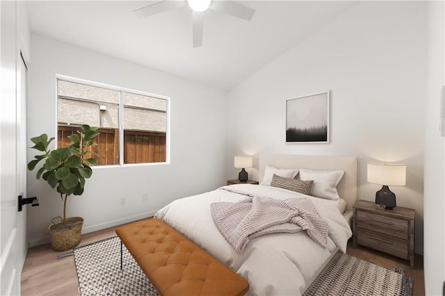 37109 Daisy St, Palmdale, CA 93550 - bedroom with light wood finished floors, vaulted ceiling, baseboards, and ceiling fan