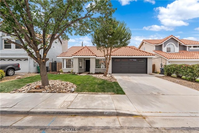 37109 Daisy St, Palmdale, CA 93550 - view of front of house featuring a tiled roof, an attached garage, driveway, a front lawn, and brick siding