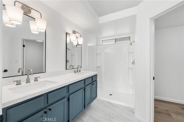 37109 Daisy St, Palmdale, CA 93550 - bathroom with double vanity, a shower, and marble finish floors