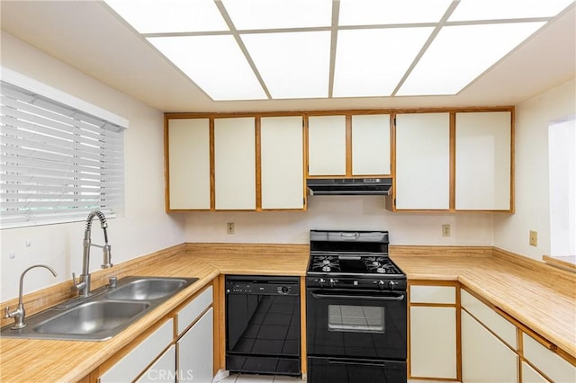 2905 Montrose Ave Unit 318, La Crescenta, CA 91214 - kitchen with black appliances, a sink, under cabinet range hood, and light countertops