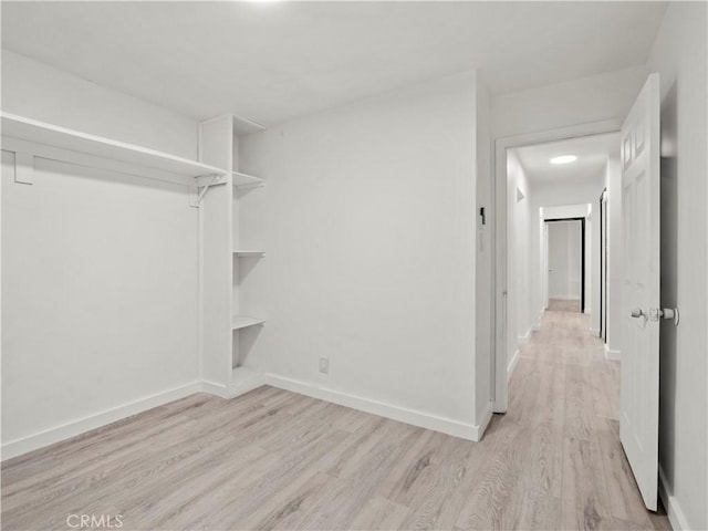 38809 Juniper Tree Rd, Palmdale, CA 93551 - walk in closet featuring light wood finished floors