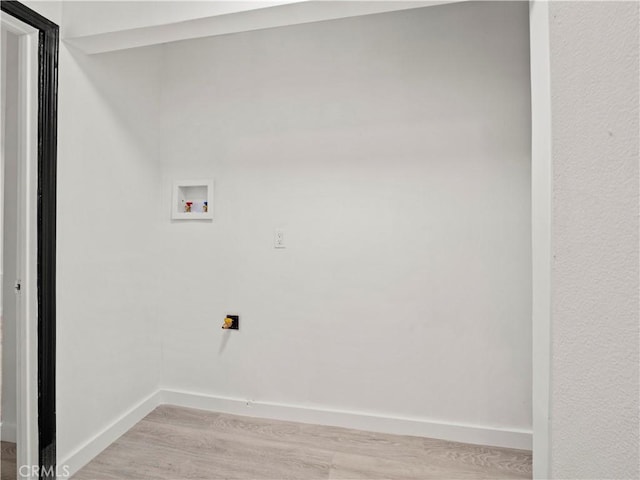 38809 Juniper Tree Rd, Palmdale, CA 93551 - washroom featuring light wood-style flooring, baseboards, and hookup for a washing machine