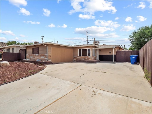 38809 Juniper Tree Rd, Palmdale, CA 93551 - view of front of house featuring stone siding and concrete driveway