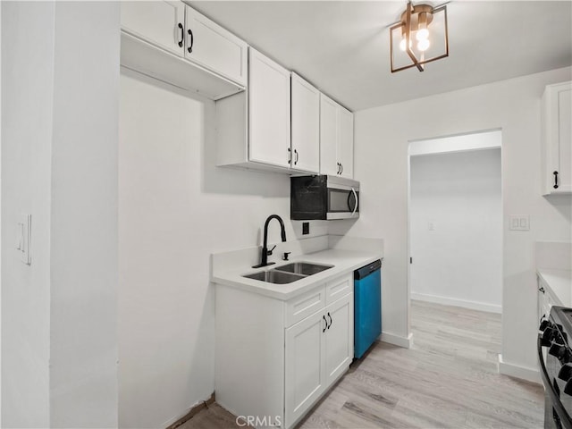 38809 Juniper Tree Rd, Palmdale, CA 93551 - kitchen with dishwashing machine, stainless steel microwave, a sink, range with gas cooktop, and light countertops