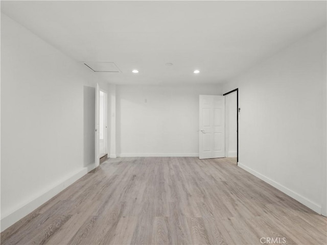 38809 Juniper Tree Rd, Palmdale, CA 93551 - spare room with light wood-type flooring, recessed lighting, and baseboards