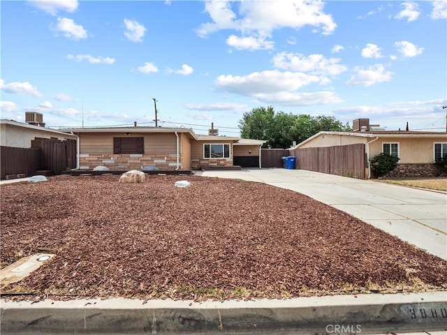 38809 Juniper Tree Rd, Palmdale, CA 93551 - ranch-style home featuring driveway and central air condition unit