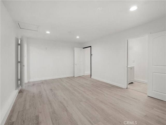38809 Juniper Tree Rd, Palmdale, CA 93551 - spare room featuring light wood finished floors, recessed lighting, and baseboards