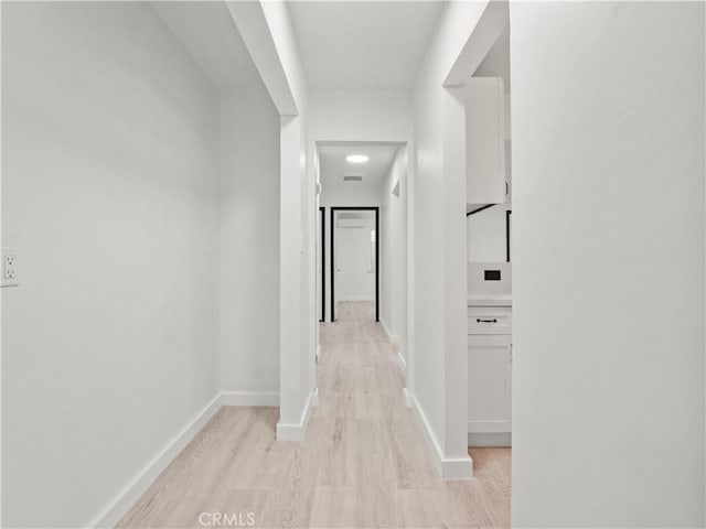 38809 Juniper Tree Rd, Palmdale, CA 93551 - hallway with light wood-type flooring and baseboards