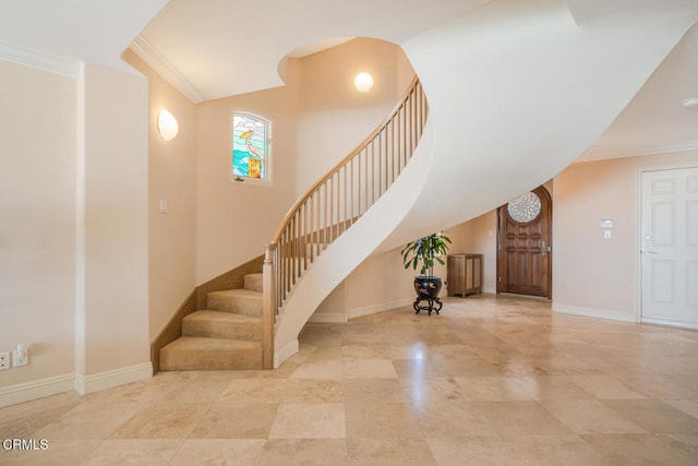 4165 Ocean Dr, Oxnard, CA 93035 - stairs with baseboards and crown molding