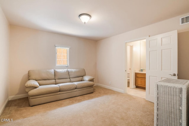 4165 Ocean Dr, Oxnard, CA 93035 - living area featuring light carpet and baseboards