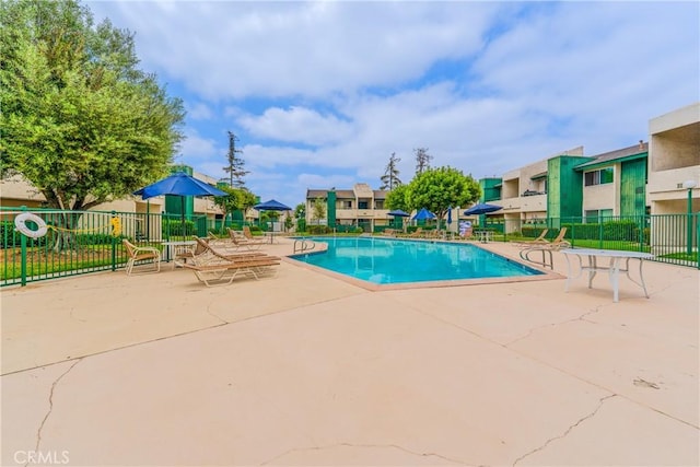 15321 Santa Gertrudes Ave Unit J210, La Mirada, CA 90638 - community pool with a patio area and a residential view