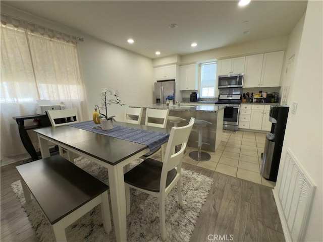 22111 Main St Unit 6, Carson, CA 90745 - dining area featuring light wood finished floors and recessed lighting