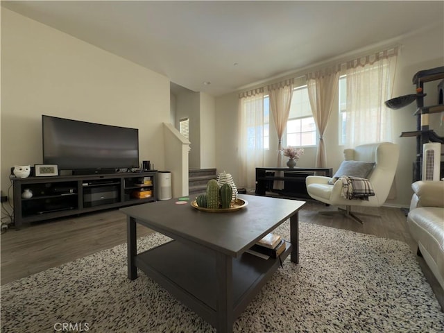 22111 Main St Unit 6, Carson, CA 90745 - living room featuring wood finished floors and stairway