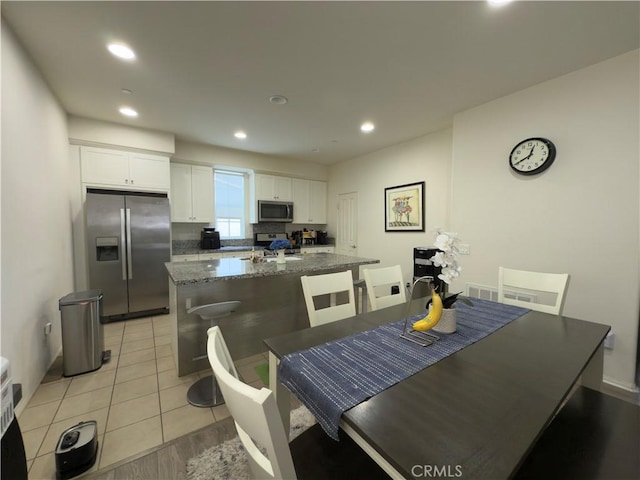 22111 Main St Unit 6, Carson, CA 90745 - dining space with recessed lighting and light wood finished floors