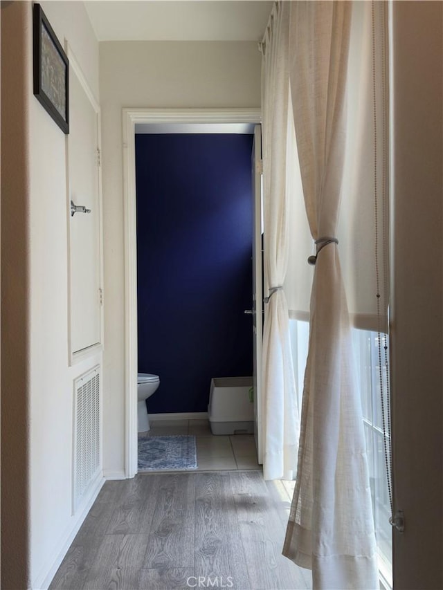 22111 Main St Unit 6, Carson, CA 90745 - bathroom with toilet and wood finished floors