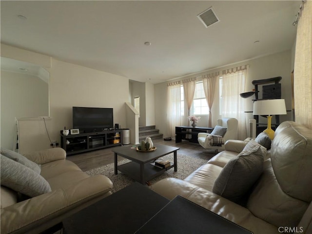 22111 Main St Unit 6, Carson, CA 90745 - living room featuring wood finished floors and stairs