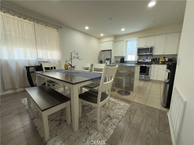 22111 Main St Unit 6, Carson, CA 90745 - dining space featuring light wood finished floors and recessed lighting