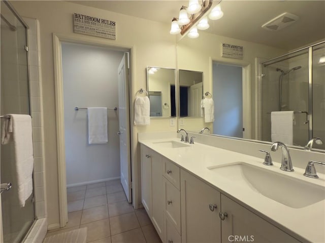 22111 Main St Unit 6, Carson, CA 90745 - full bath with a stall shower, double vanity, and tile patterned flooring